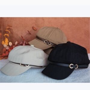 Elegant Women's Caps in Black, Cream, and Tan